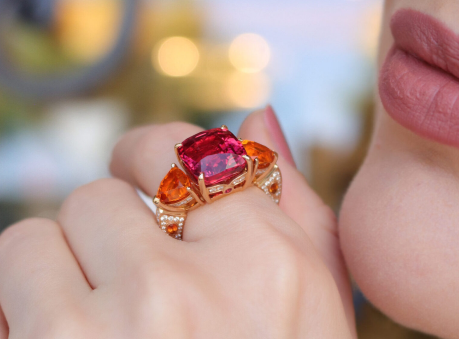 Spinel cocktail ring worn on hand